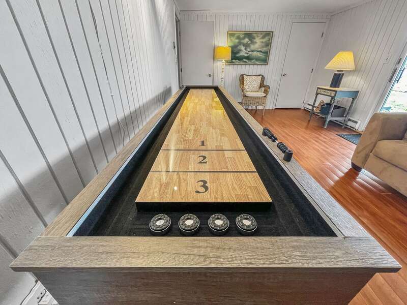 Fun shuffle board/bowling table in the lower level - 84 Cranberry Lane Chatham Cape Cod - Ridgevale Retreat
