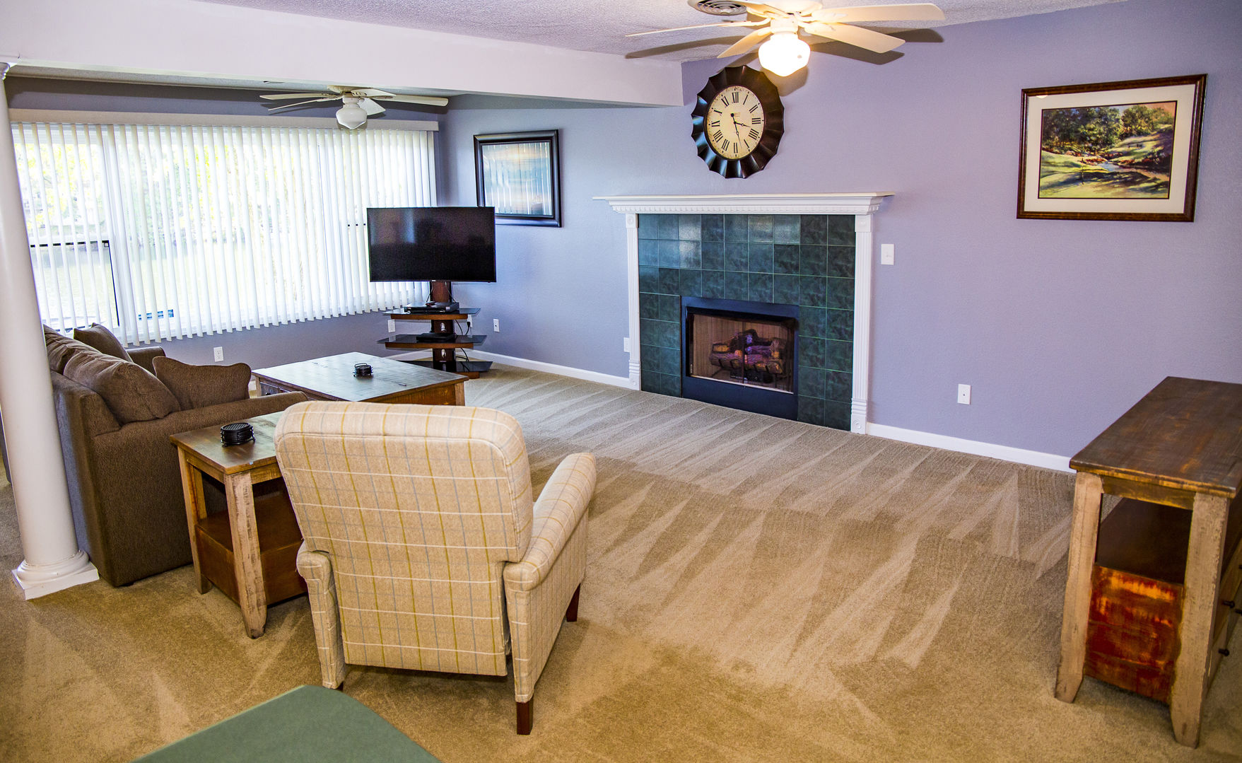 Cozy up by the fireplace in Lakeshore Terrace #36
