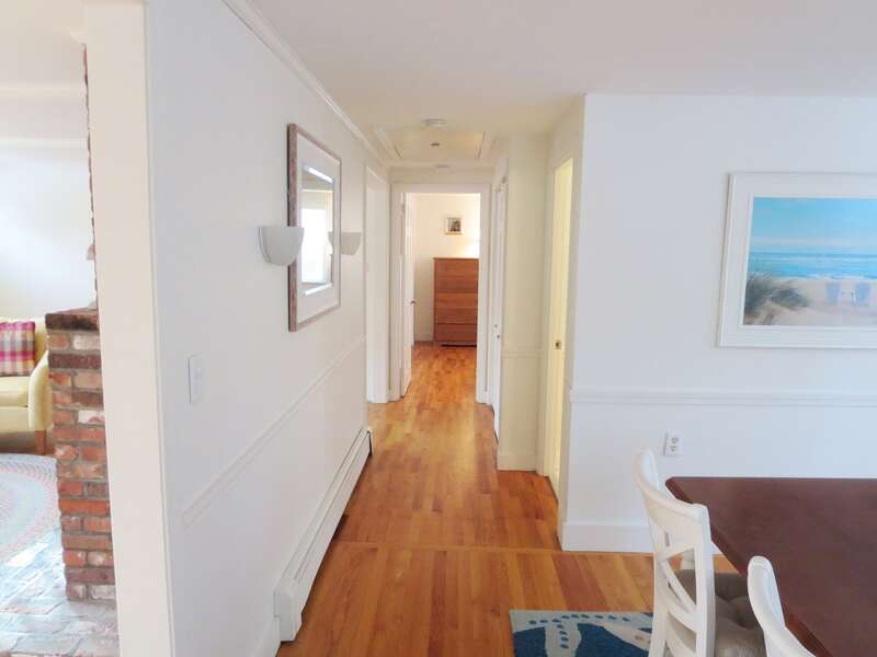 Hallway from kitchen to Bedrooms 2 & 3 as well as the full bath and laundry area - 142 George Ryder Road S Chatham Cape Cod - New England Vacation Rentals