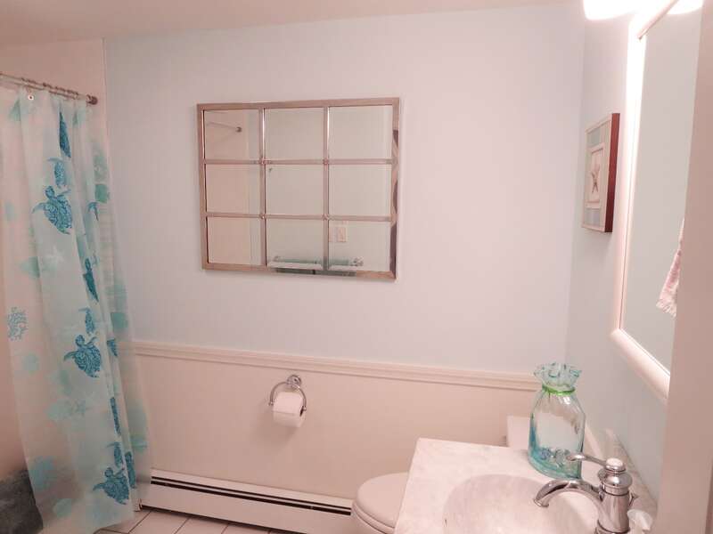 Full bath with tub and shower located off of the hall - 142 George Ryder Road S Chatham Cape Cod - New England Vacation Rentals