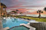 Pool in the backyard of this Luxury Vacation Rentals Destin