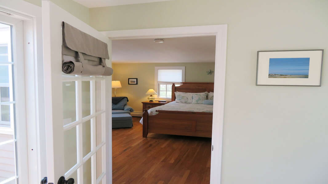 Through the sunroom, to access the master bedroom - 33 Pine Grove West Harwich Cape Cod -  New England Vacation Rentals