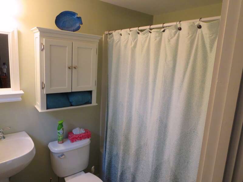 En suite full bath with a tub and shower - 33 Pine Grove West Harwich Cape Cod -  New England Vacation Rentals