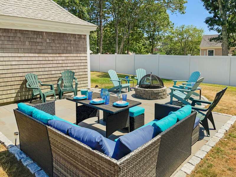 Everyone is included in the fun on this wonderful new patio with multiple seating and conversation areas - 33 Pine Grove West Harwich Cape Cod -  New England Vacation Rentals