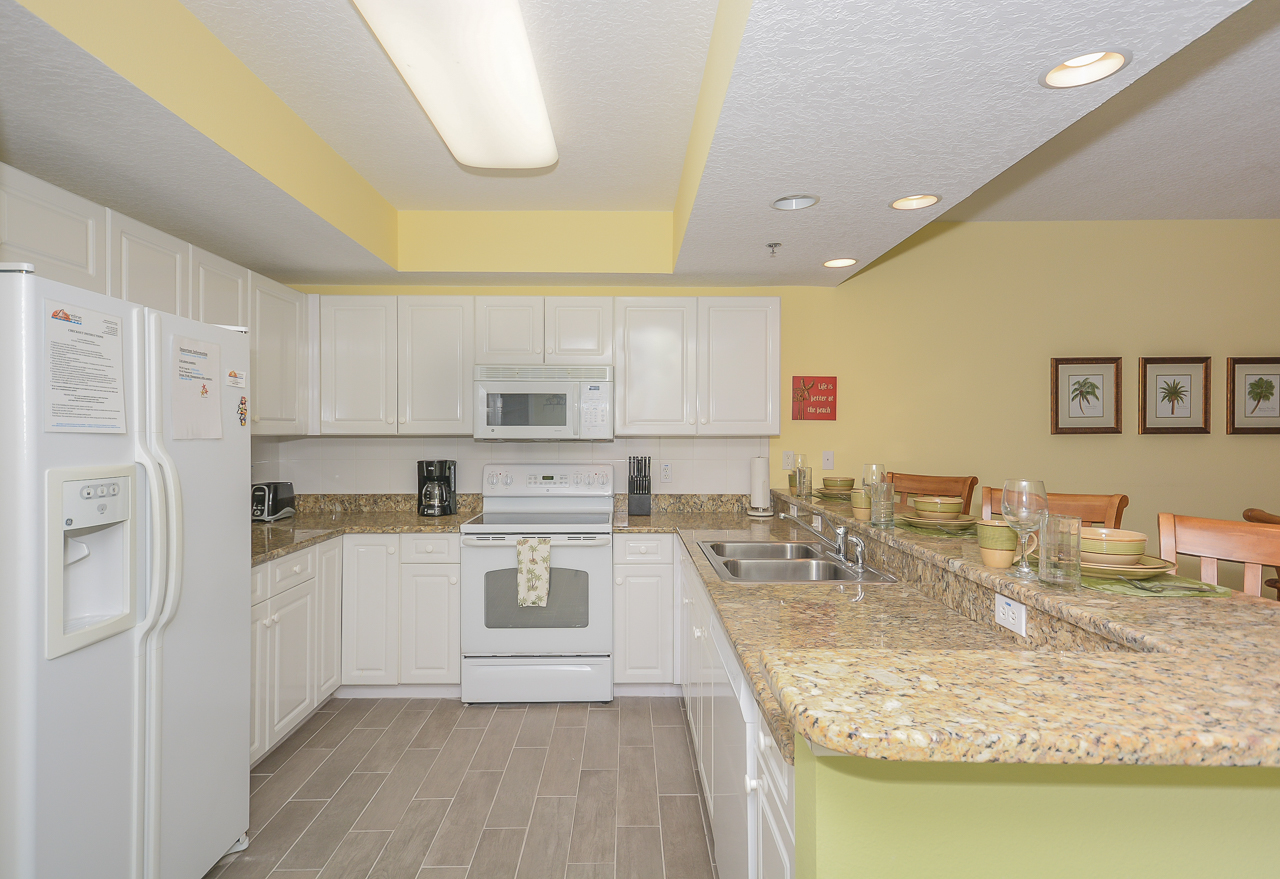 Fully equipped kitchen with granite counter tops and new appliances.