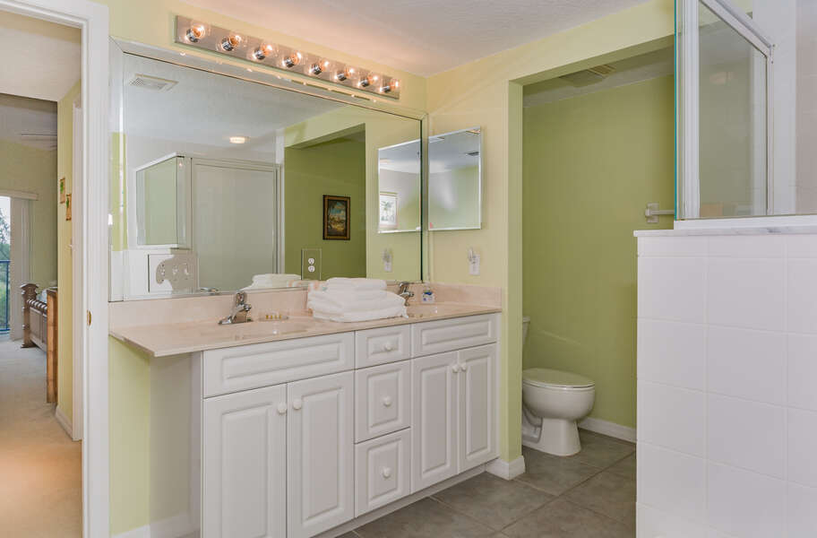 Large master bath with double sinks and walk in shower.