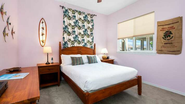 Guest bedroom with Queen Bed and Tropical Decor at Waikoloa Fairways Hawai'i Rental