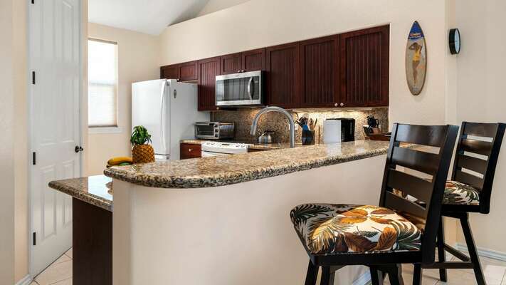 Well-Equipped Kitchen with Bar Seating at Waikoloa Fairways Hawaii Rental