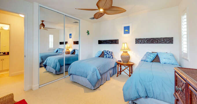 Bedroom with Twin Beds with Blue Linens