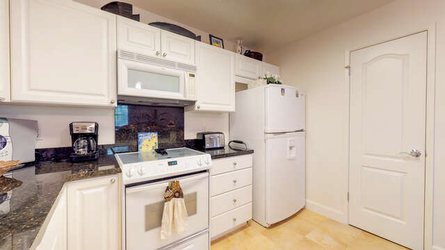 Kitchen with White Appliances in our Ko Olina Kai Rental