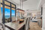 Floor to Ceiling Windows offer Spectacular Views from Dining and Living Areas!