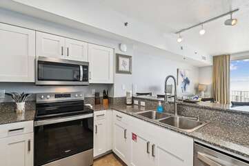 full kitchen with stainless appliances