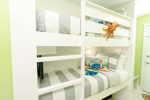 Custom made bunk beds (a little smaller than a twin), super comfy! Kiddos love the stuffed creatures and added extras!