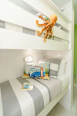 How fun are these bunk beds?!? On the other end is a built-in TV! Kids will LOVE these bunks!