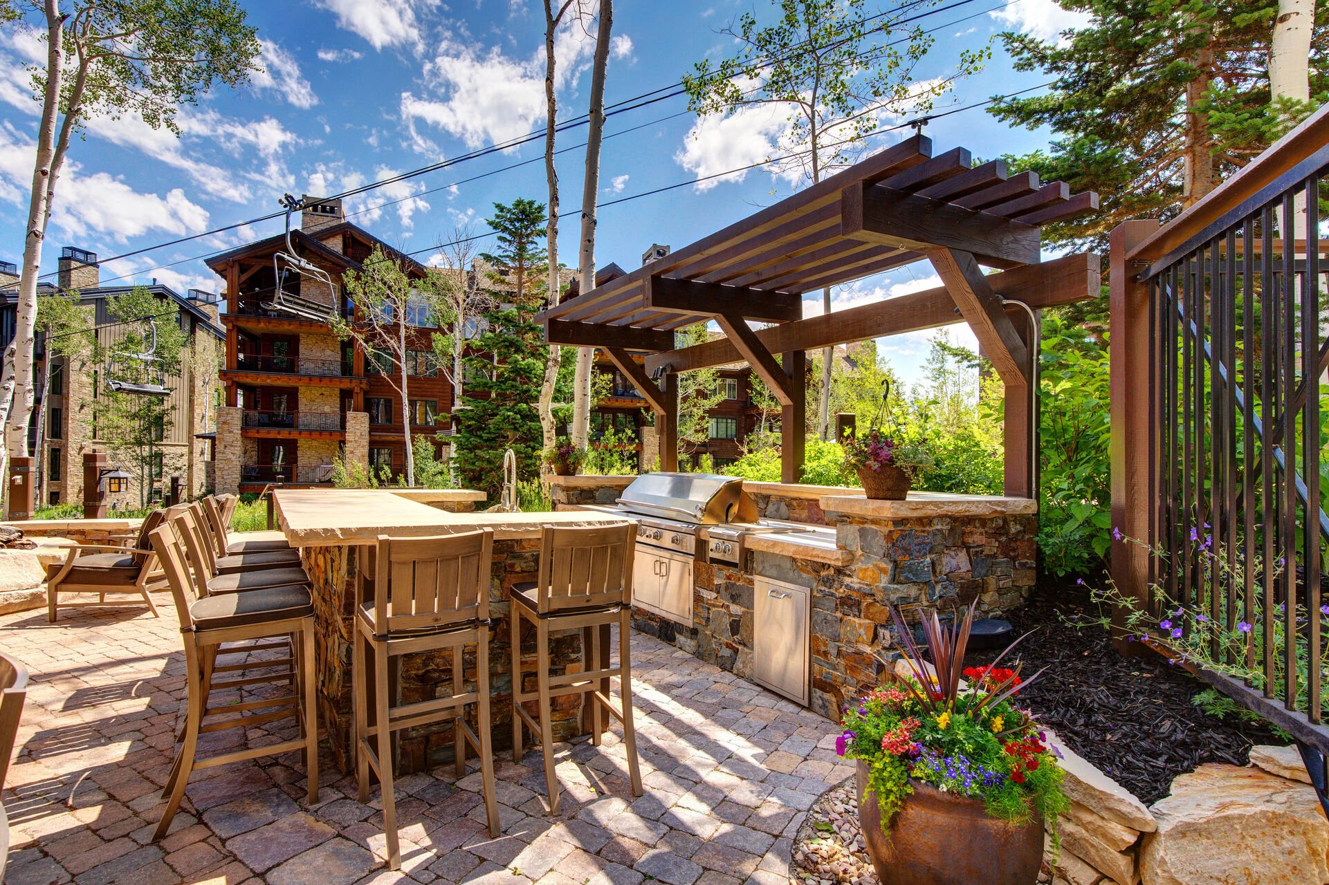 Lodge Patio with a Communal BBQ and Bar Seating