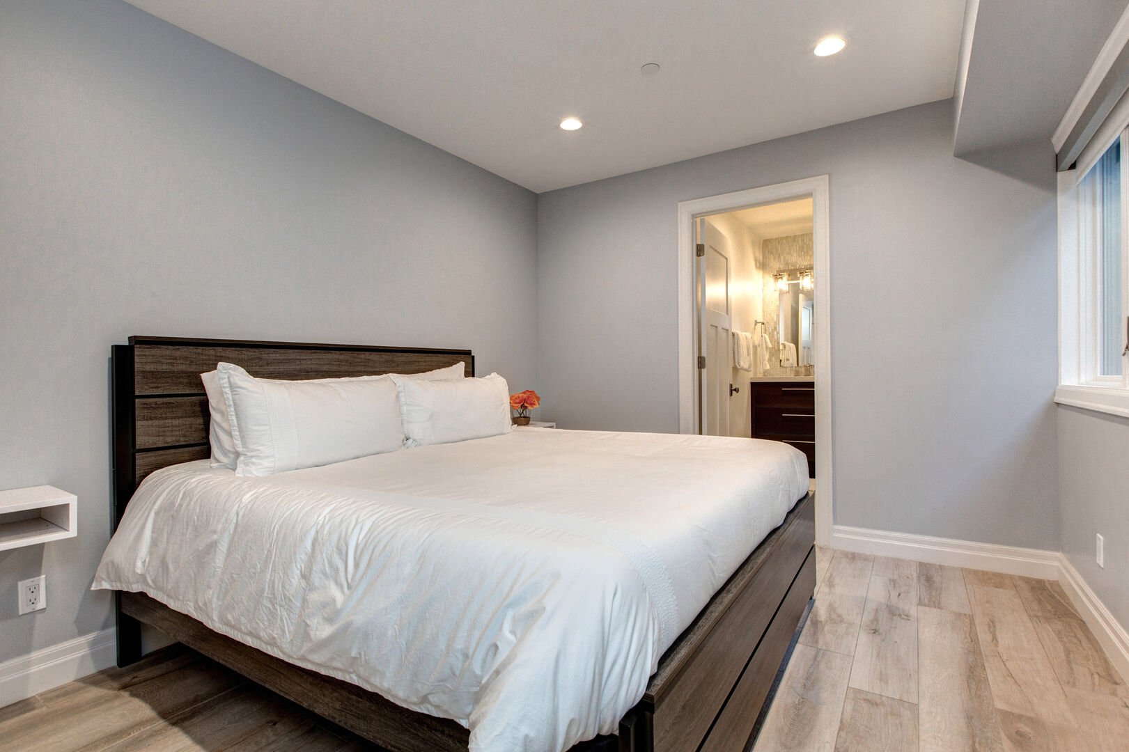Bedroom 3 | Lower Level, King Bed, TV, Closet, Full Ensuite Bathroom with Shower/Tub Combo | Abode at First Chair