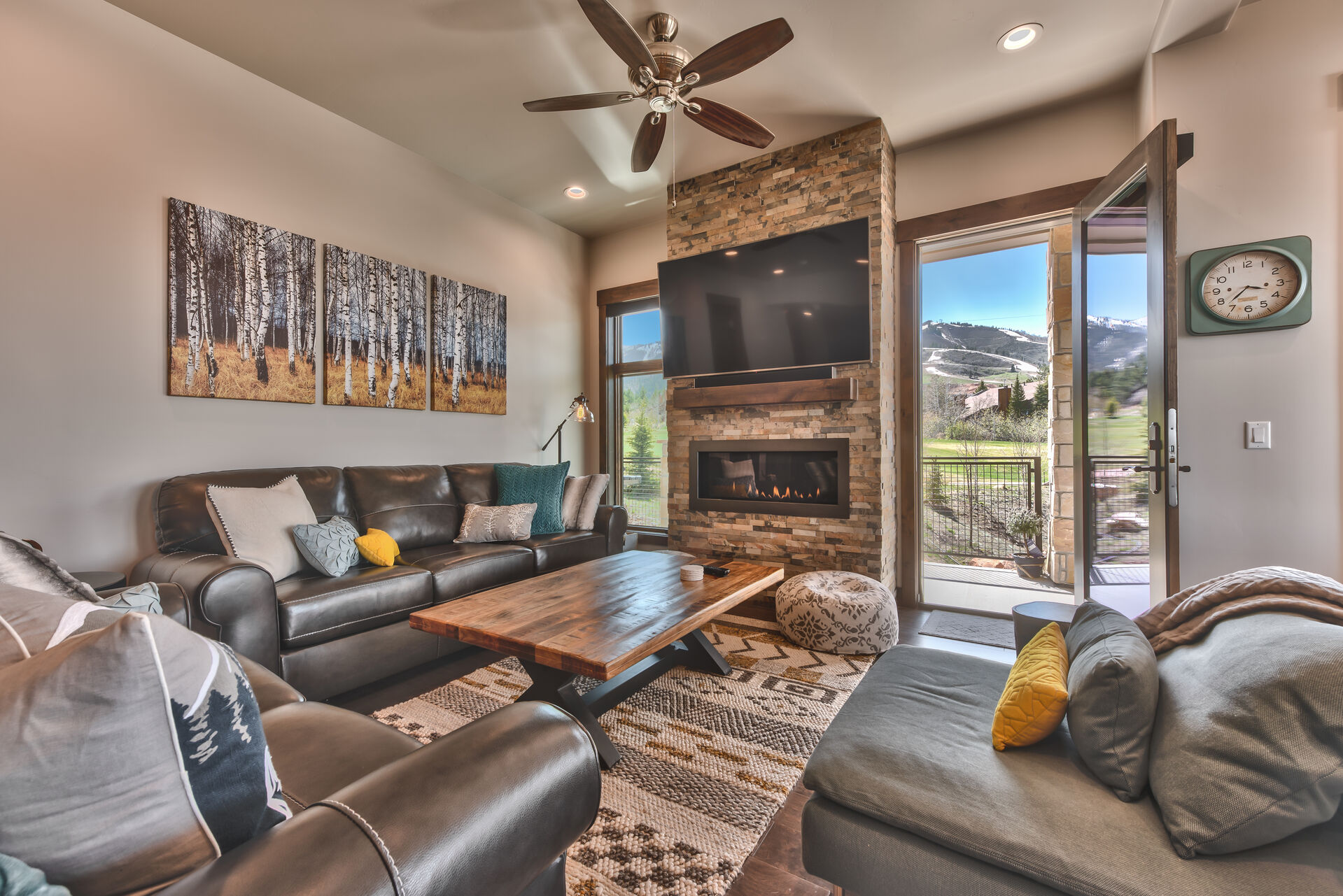 Comfortable Mountain Contemporary Furnishings, including a queen sleeper sofa, with a 65