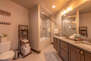 Private Bath with Dual Sinks and Quartz Counter, and a Tub/Shower Combo