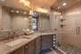Master Bath with Dual Sinks and a Tile / Stone Shower