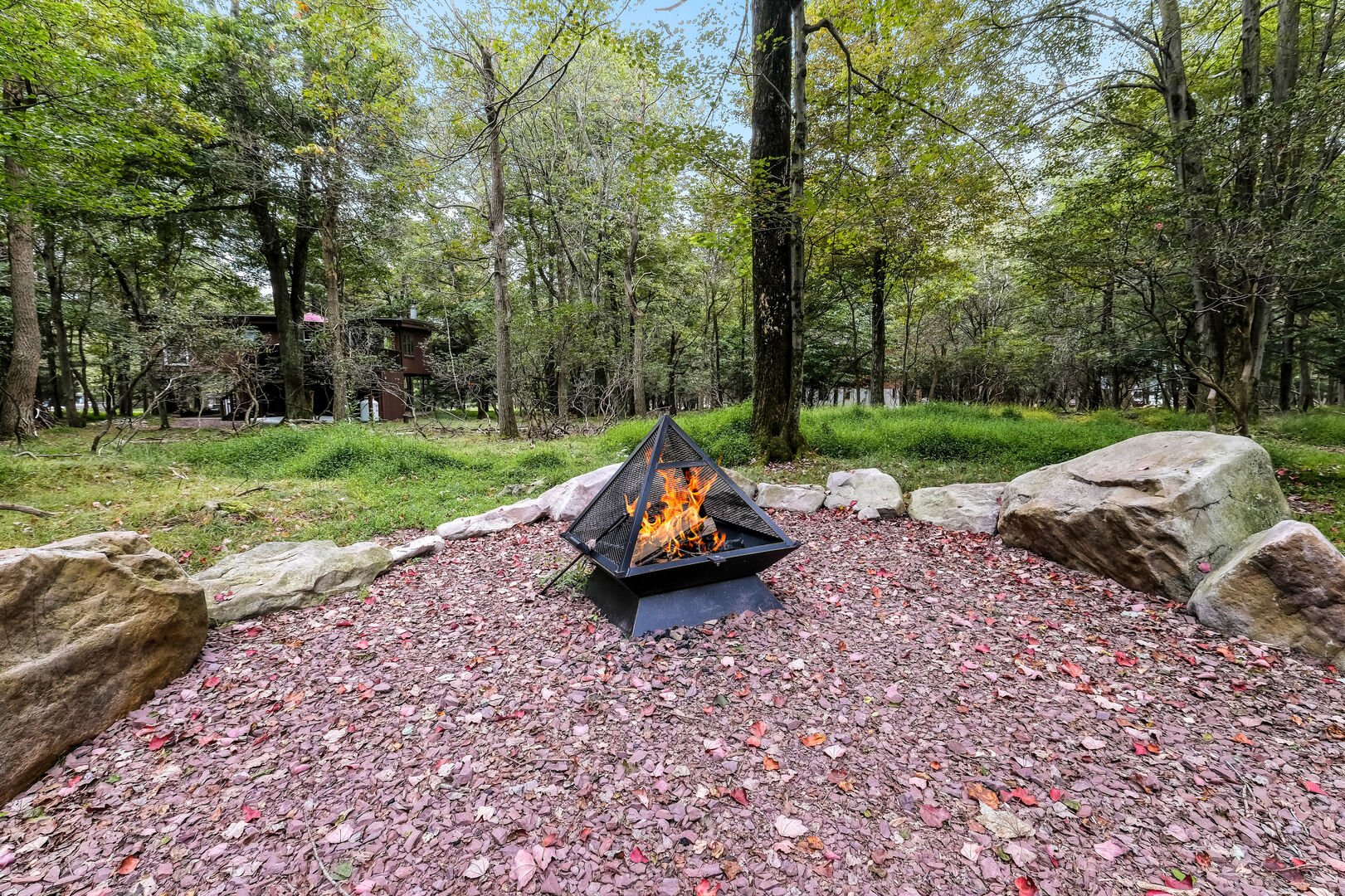 Pyramid Fire Pit in the Woods