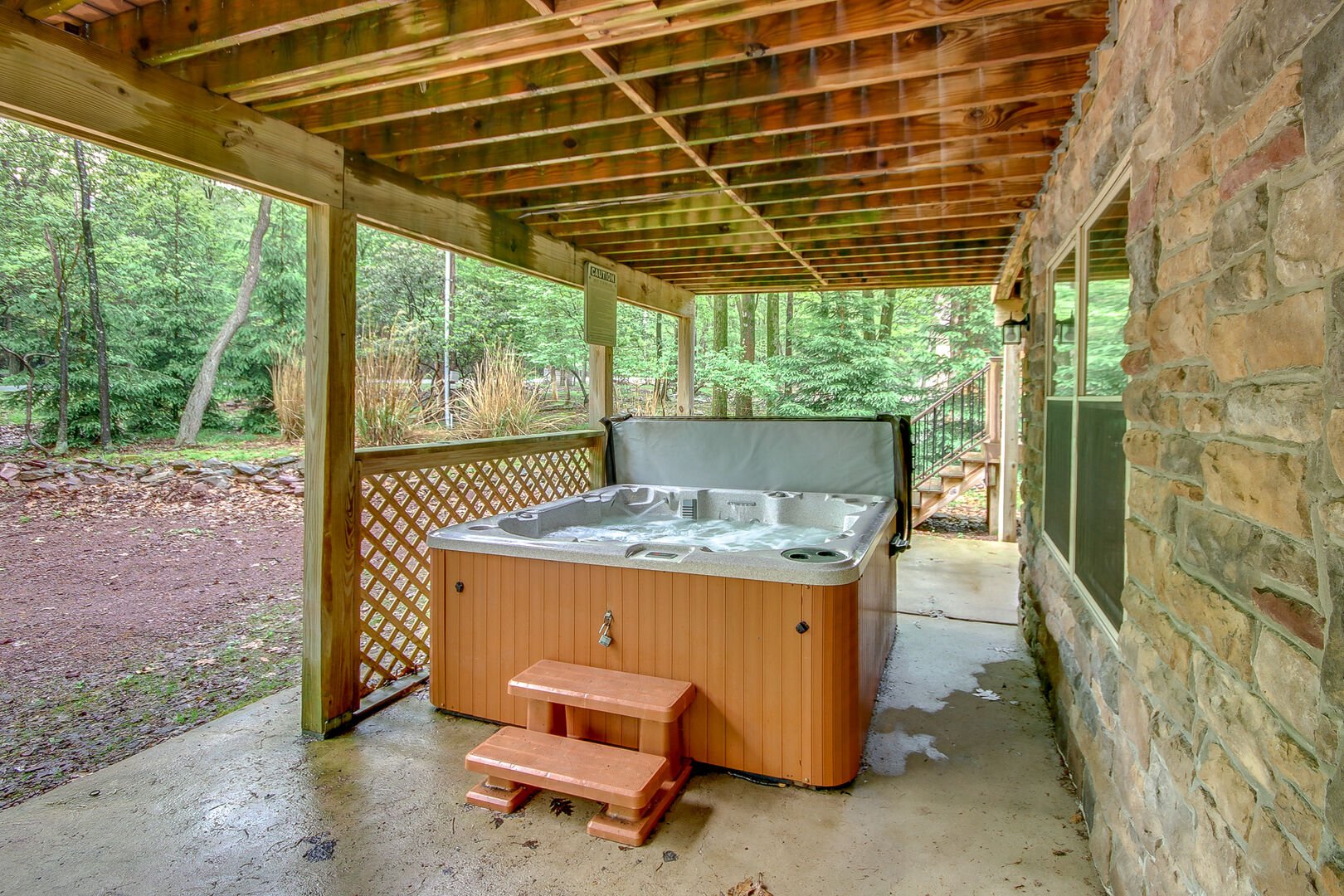 Outdoor hot tub at our Pocono Getaway Rental