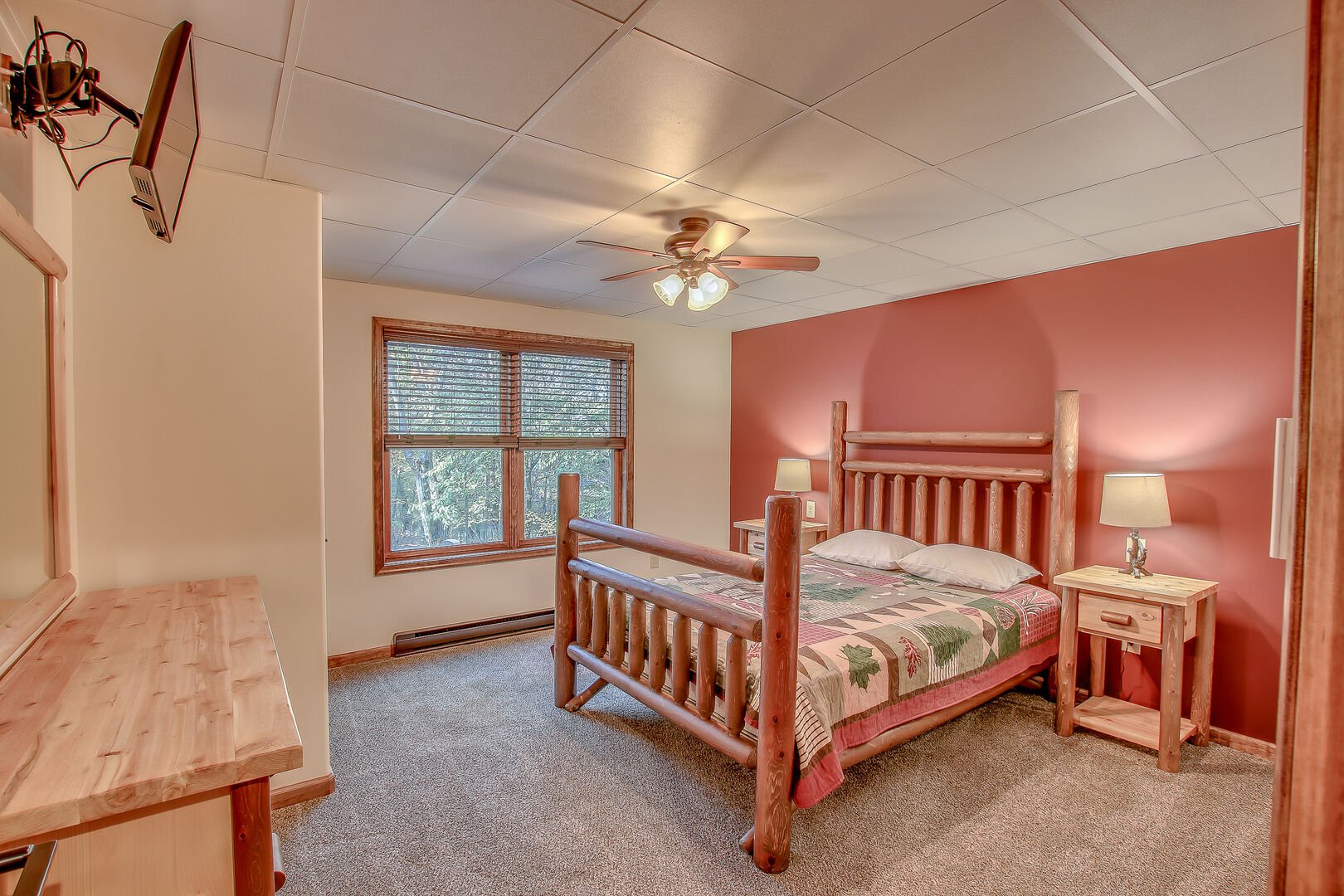 Bedroom with Bed, Nightstands and Ceiling Fan