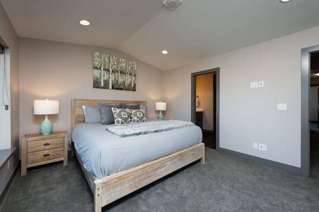 King Master Bedroom with Ensuite Bathroom & Walk Out to Upper Deck