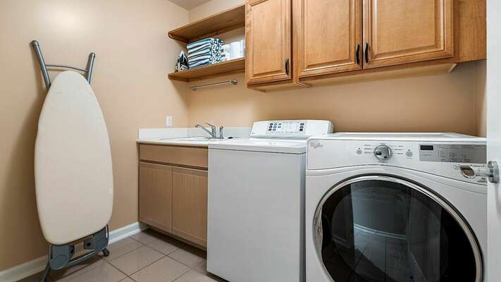 Laundry room located on the lower level with full size appliances