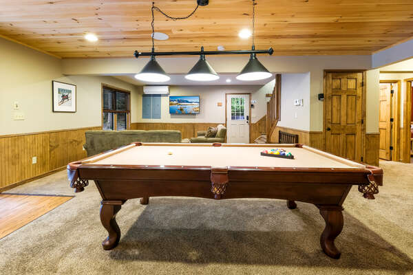 Pool table in the game room of this luxurious Poconos vacation rental.
