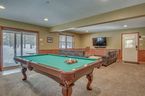 Game Room with Pool Table and TV