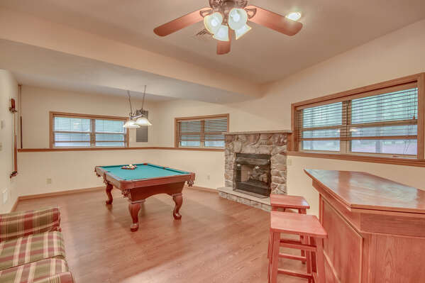 A Game Room with Pool Table Located Within Our Vacation Rental in the Poconos by Lake.
