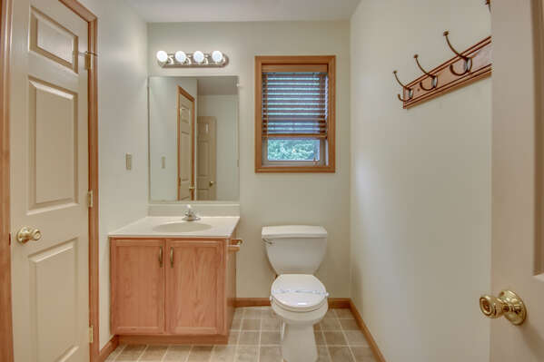 A Bathroom Image Showcasing Sink and Toilet.