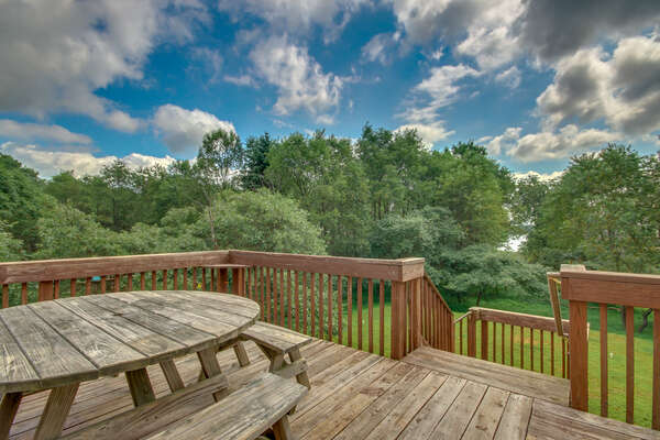 Picnic Table on Upstairs Deck with Forest View of our Towamensing Trails Vacation Rental.