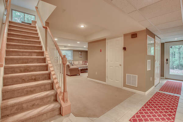 Picture of the Stairs with a View of the Living Room.