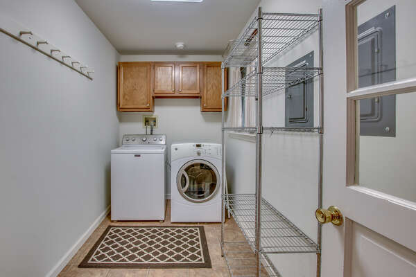 Laundry Room, with Washer, Dryer, and Drying Rack.