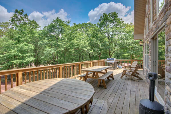 Deck with Tables, Chairs and a Grill at our Poconos Vacation Rental