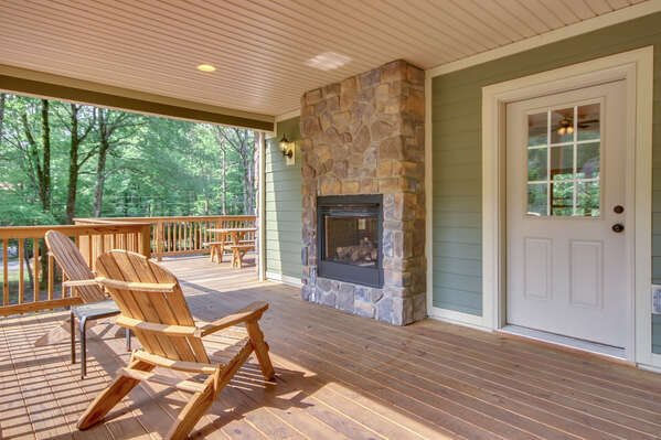 Outdoor fireplace on wrap around Porch