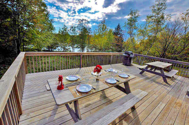 Two Picnic Tables on the Deck of our Vacation Rental Near Lake Shangri-La.