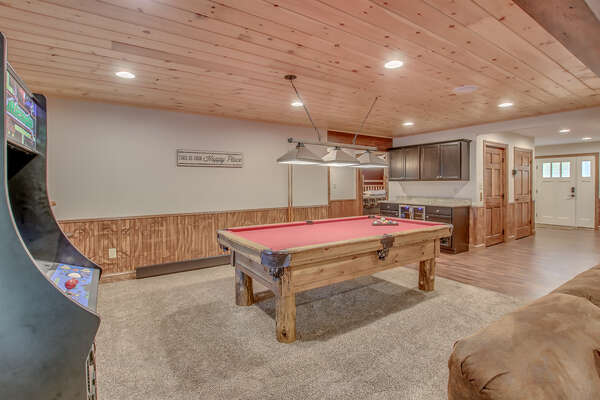 Game Room with Pool Table and Arcade Machine