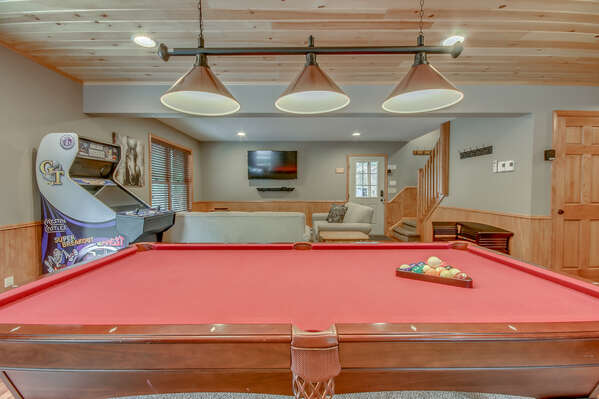 Game Room with pool table and arcade game