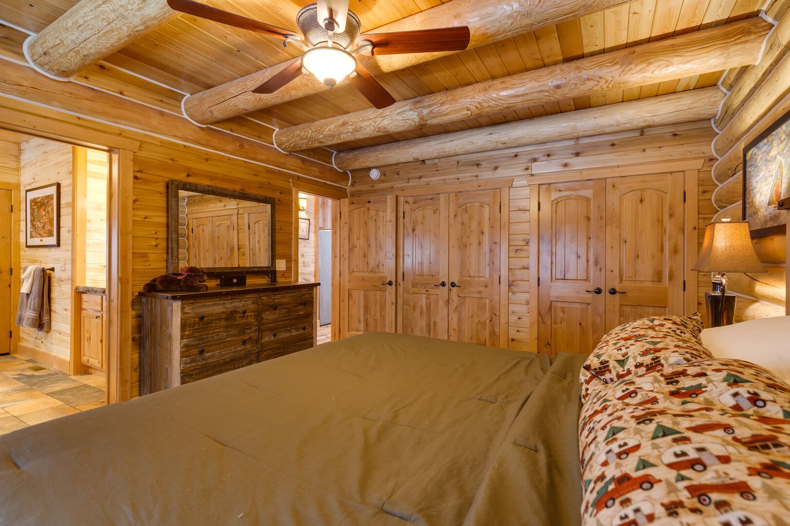 Lumberjack Lodge ~ bedroom #1 on main level w/ king bed and private ensuite bathroom