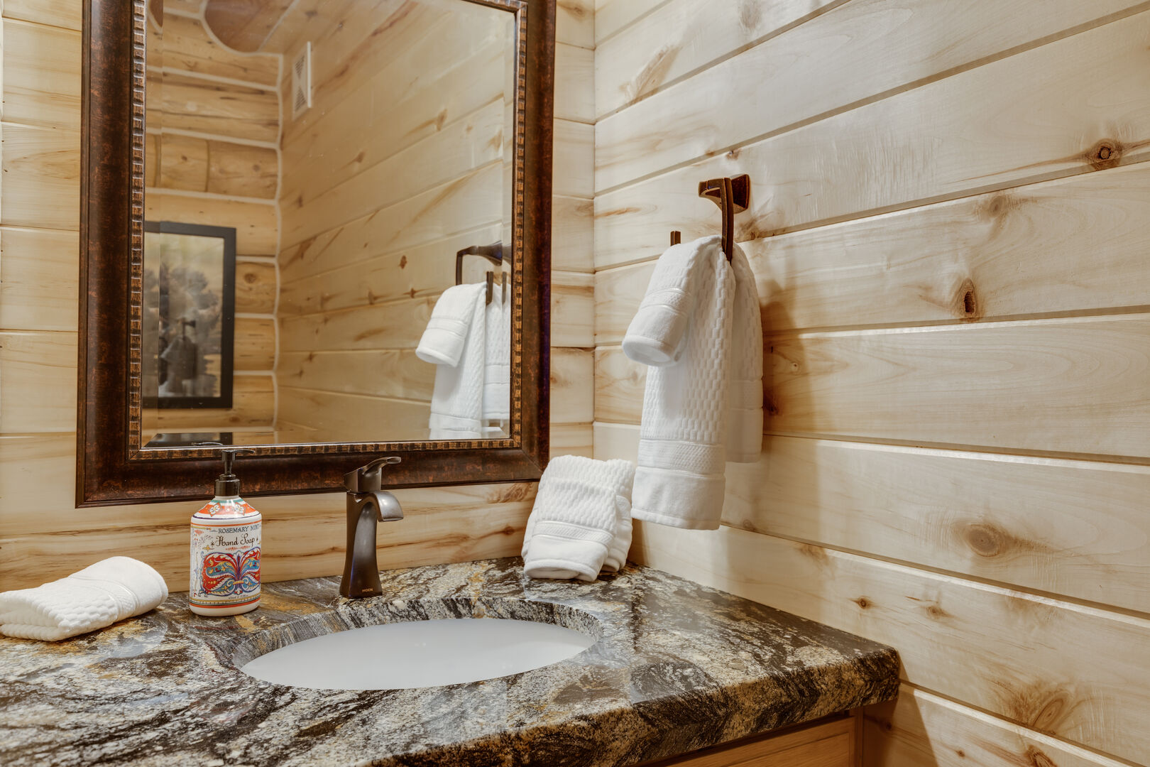 Lumberjack Lodge ~ shared half bathroom on main level