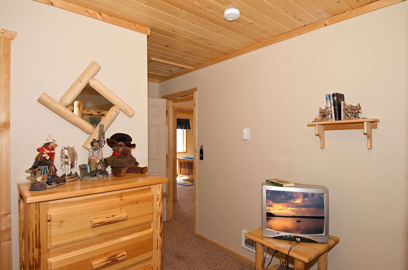 Wagon Wheel ~ bedroom #1 w/ a double over double bunk and a single over double bunk and private ensuite bathroom