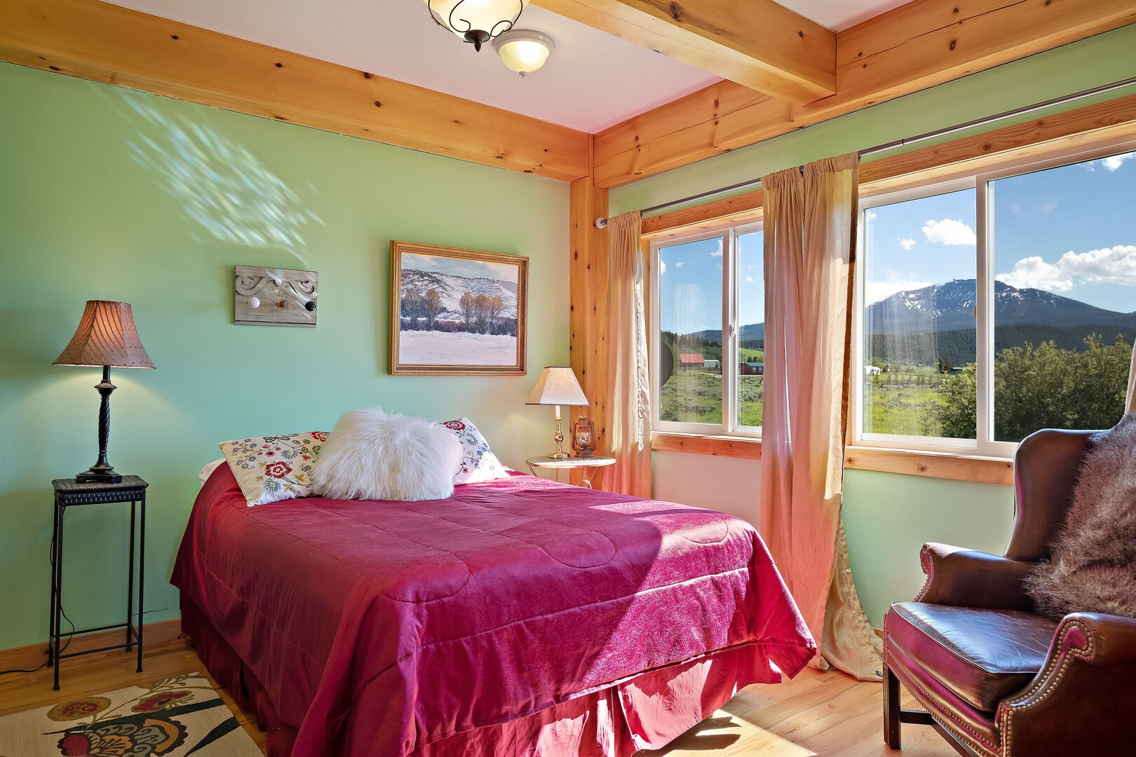 Henrys Lake Goose Bay ~ bedroom #1 on main level w/ queen bed and private access to shared bathroom