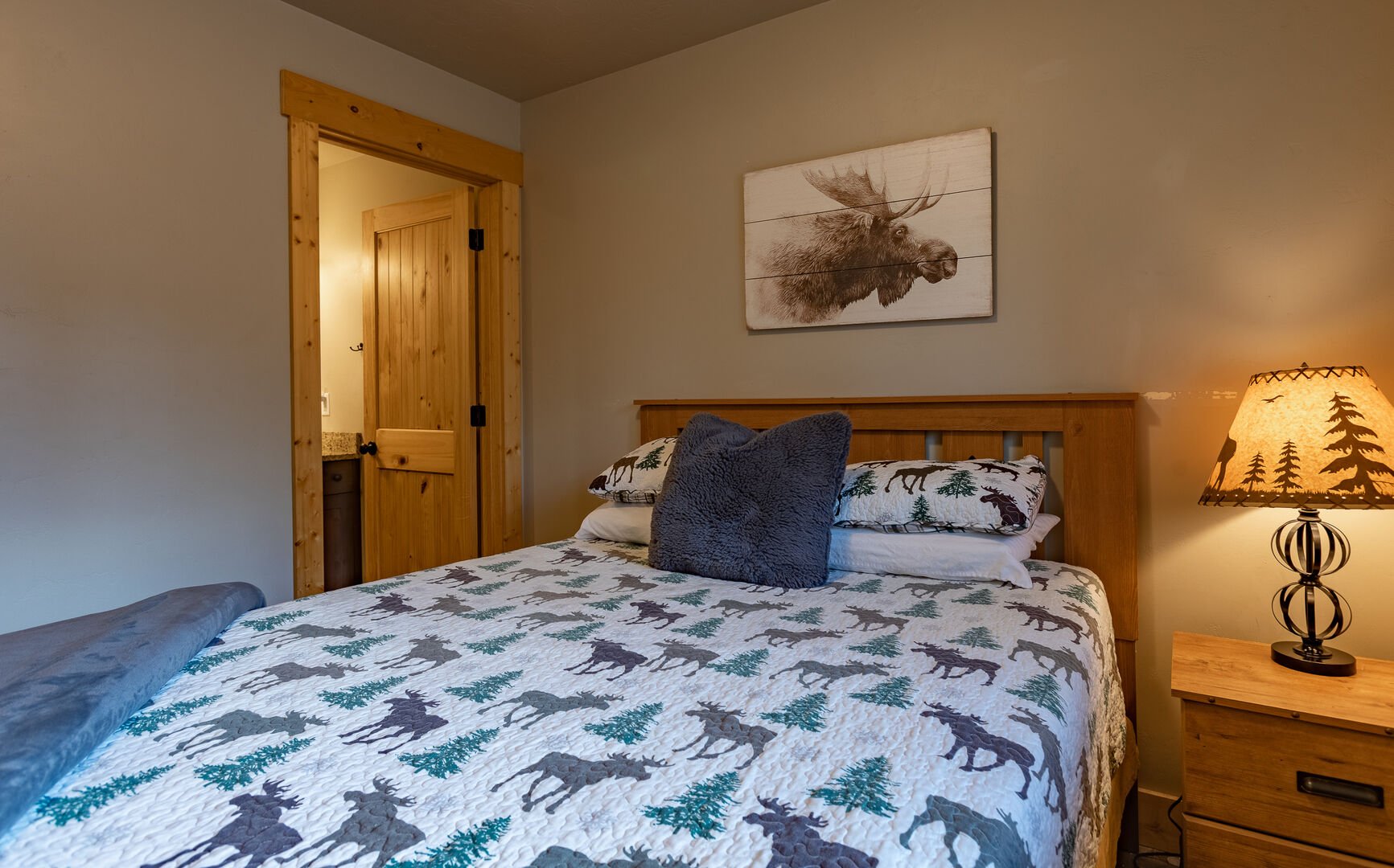 Buck Buck Moose ~ bedroom #6 on upper level w/ queen bed and private ensuite bathroom