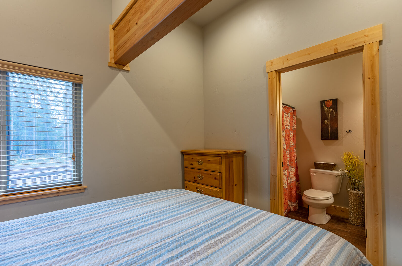 Buck Buck Moose ~ bedroom #3 on main level w/ queen bed and entrance to shared bathroom