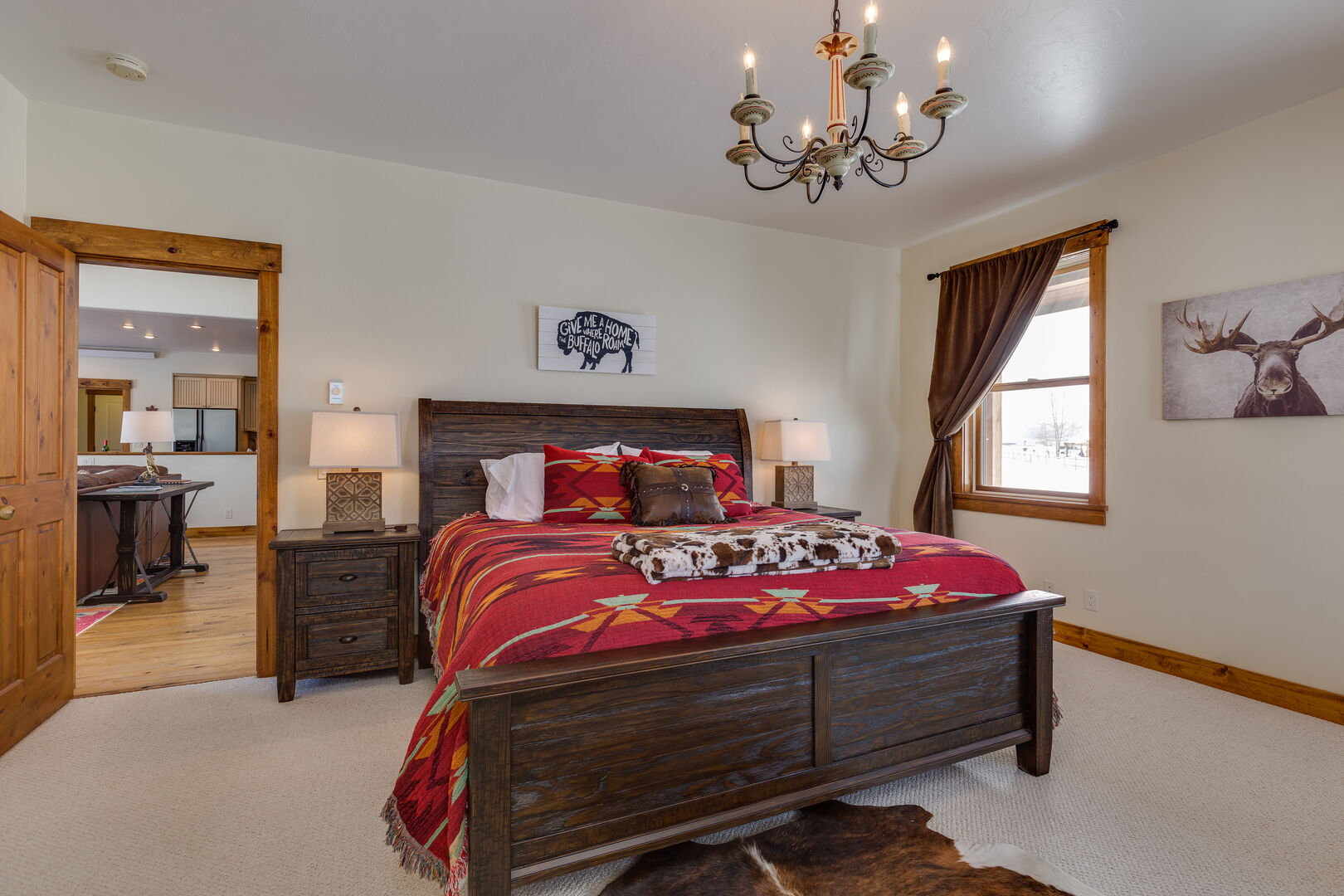Alpine Airspace ~ master bedroom #1 on main level w/ king bed and private ensuite bathroom