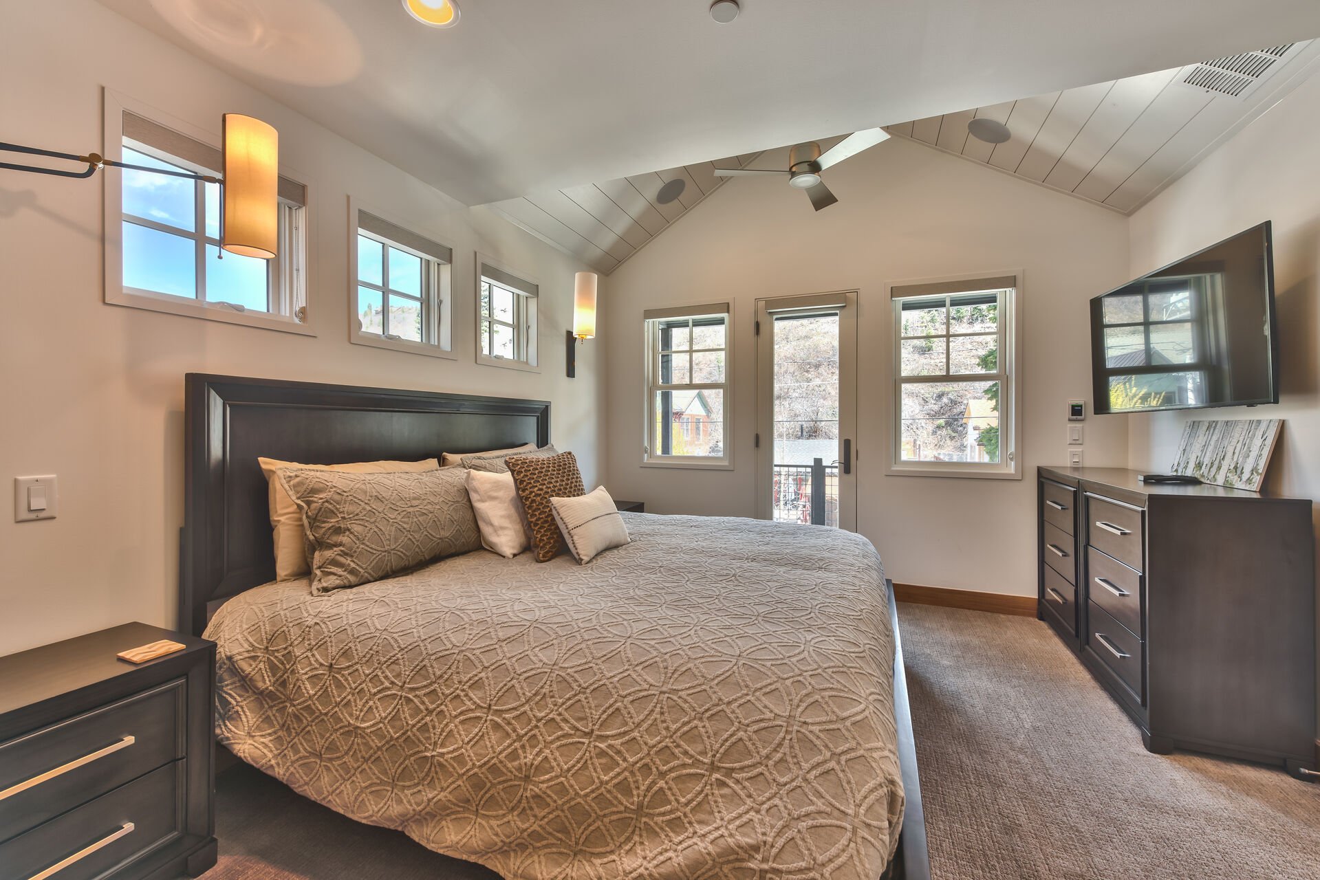 Grand Master Bedroom with King Bed, Smart TV, and Private Juliette Balcony with Park City Views