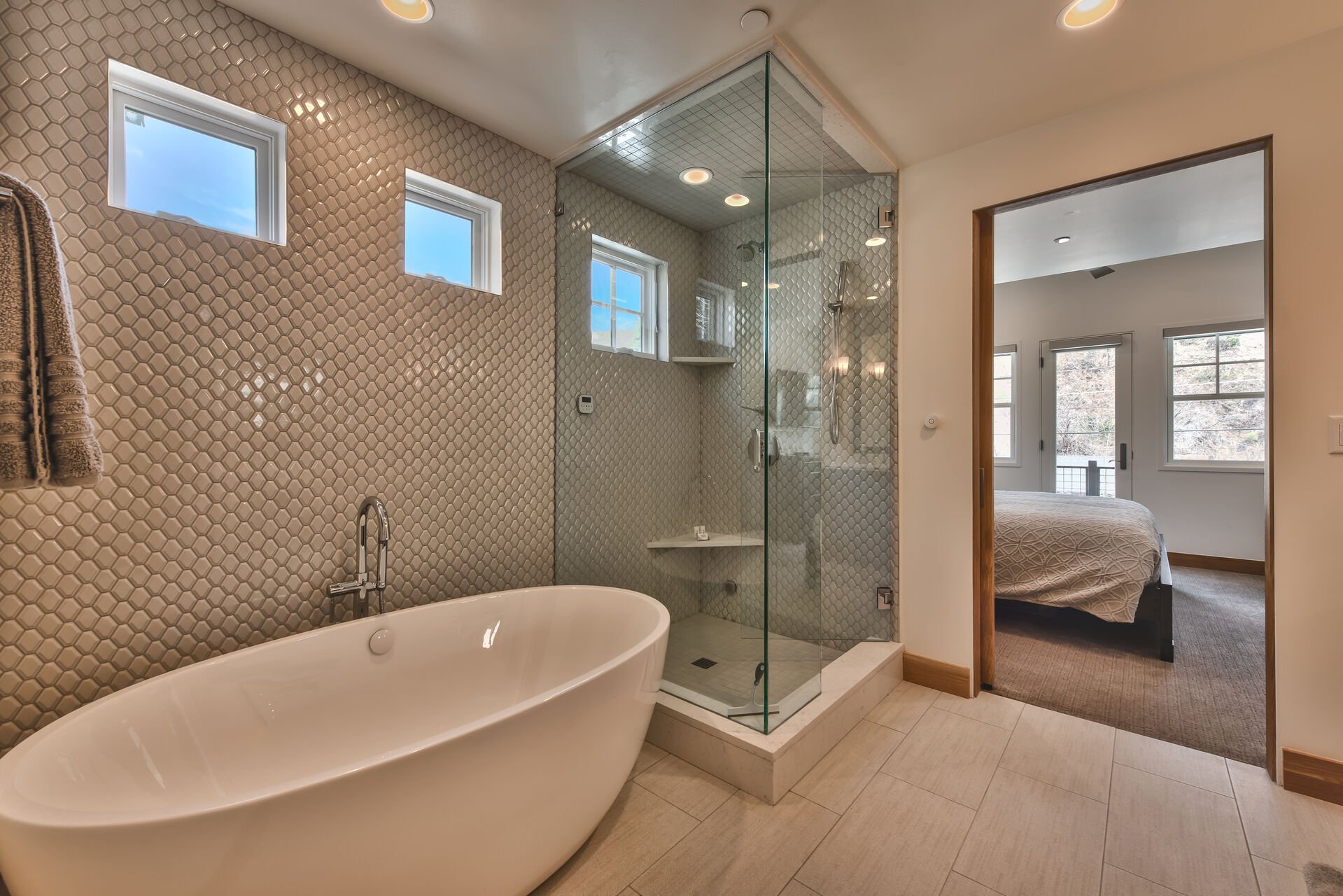 Grand Master Bath with a Steam Shower and Soaking Tub