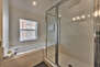 Master Bath with a Jetted Tub and Tile Shower
